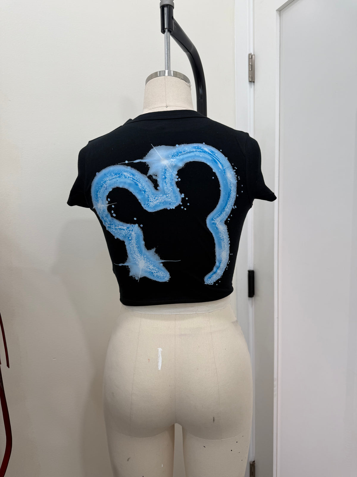 YOUR WATCHING DC BLUE BABY TEE