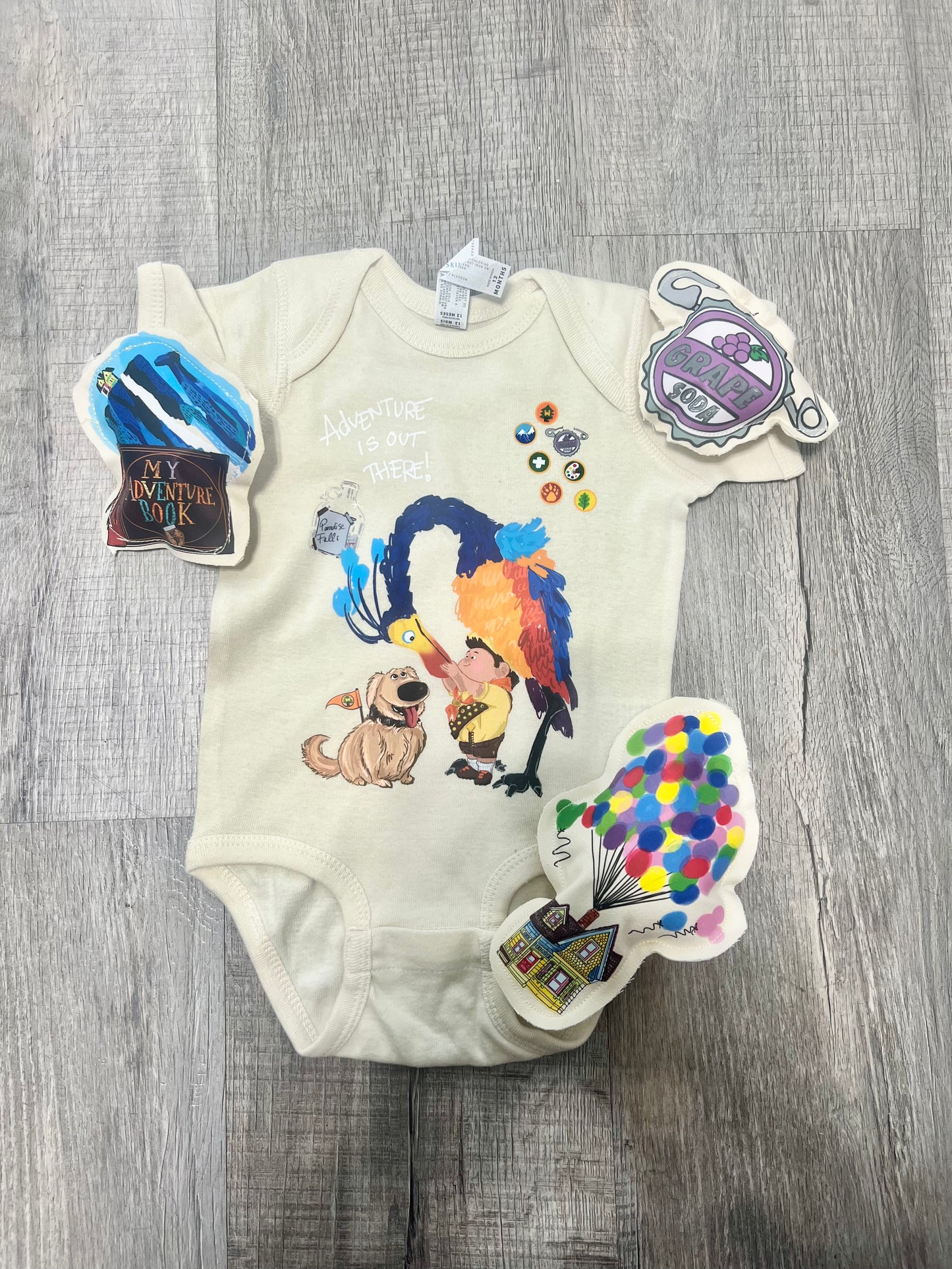 THE ADVENTURE IS OUT THERE ONESIE