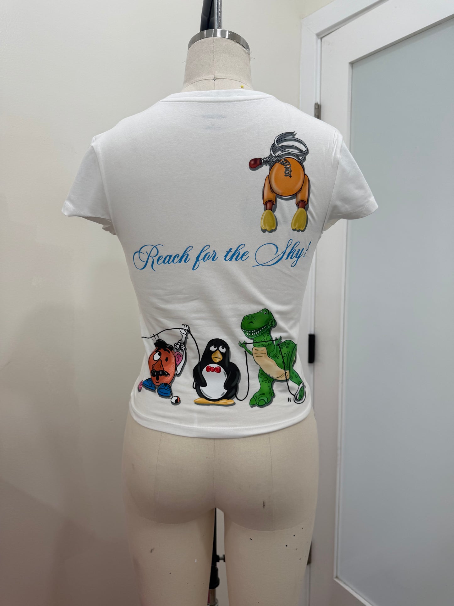 REACH FOR THE SKY BABY TEE
