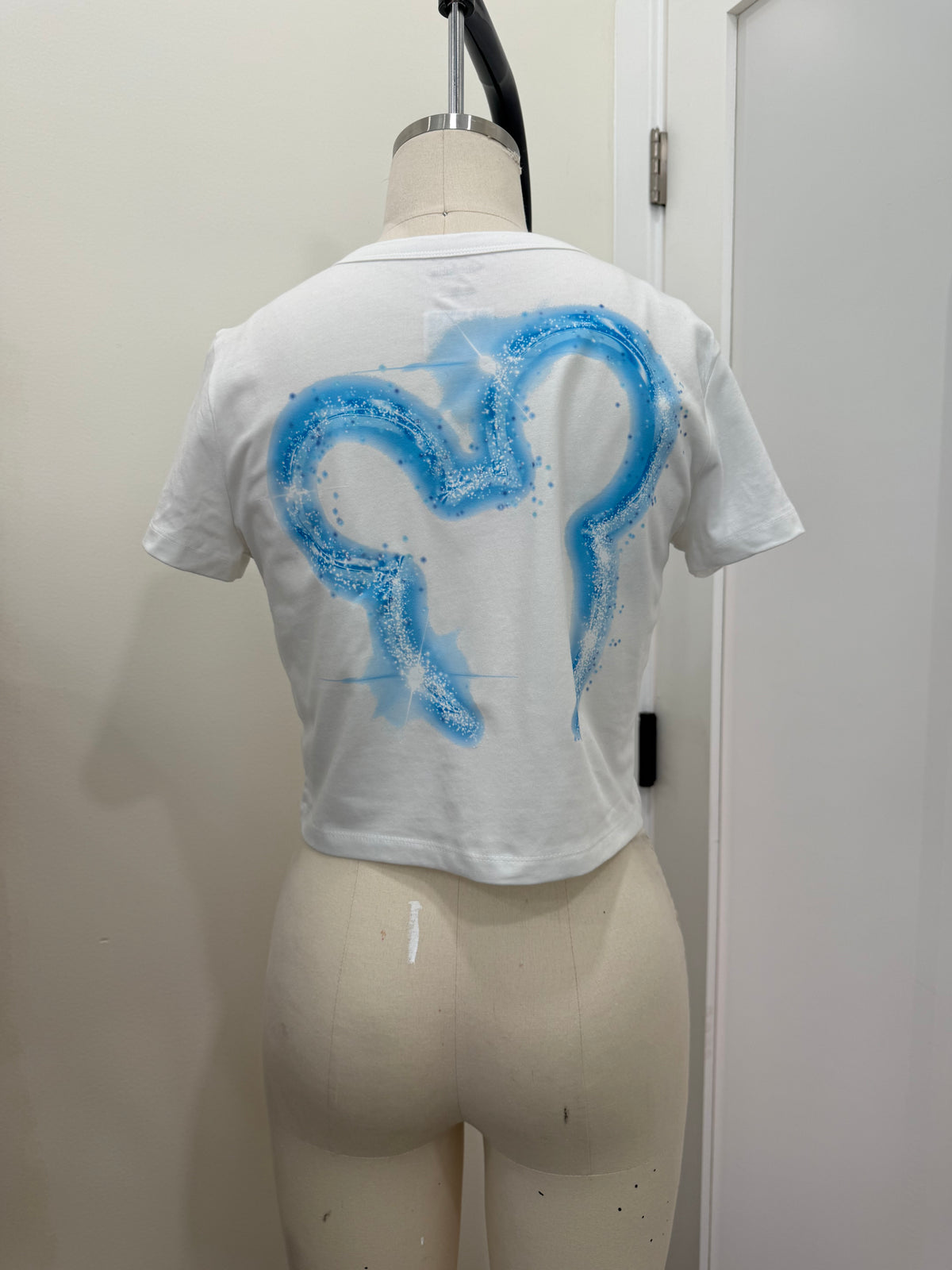 YOUR WATCHING DC BLUE BABY TEE