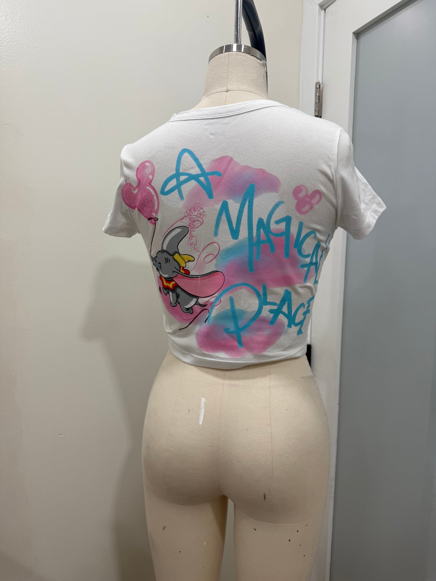 A MAGICAL PLACE BABY TEE