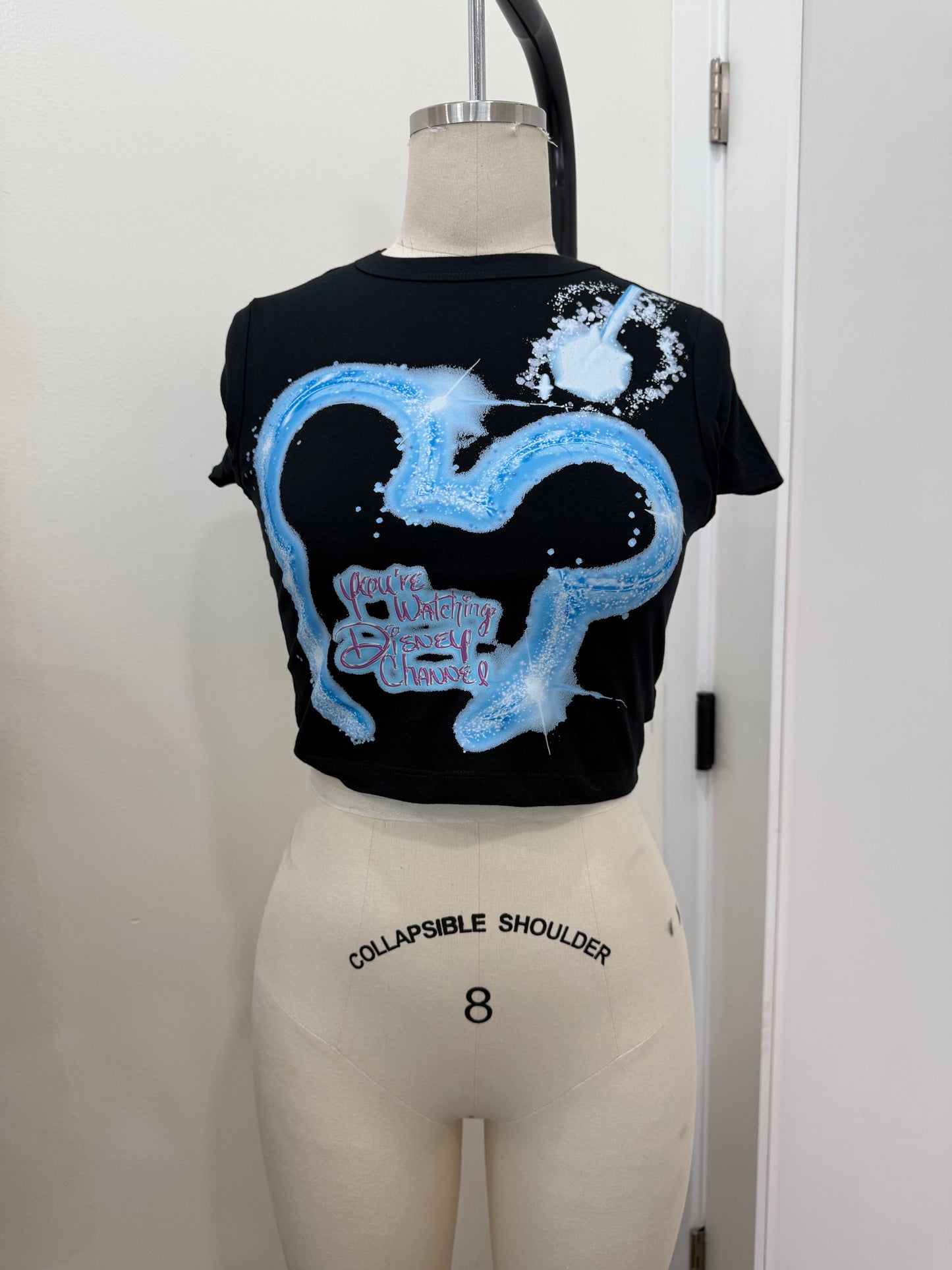 YOUR WATCHING DC BLUE BABY TEE