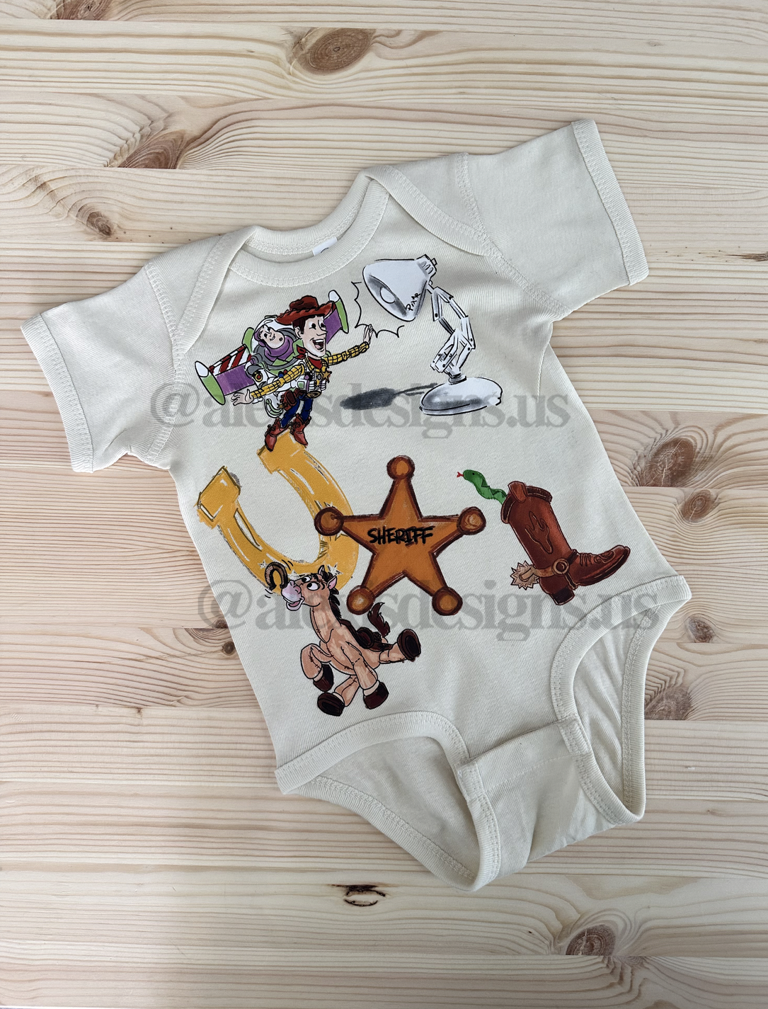 SNAKE IN MY BOOT ONESIE