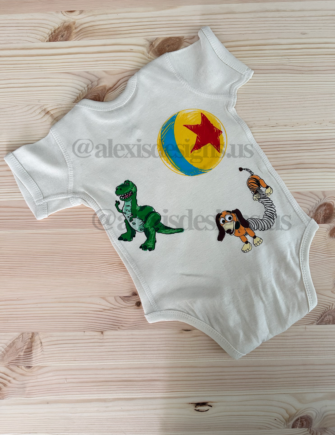 SNAKE IN MY BOOT ONESIE